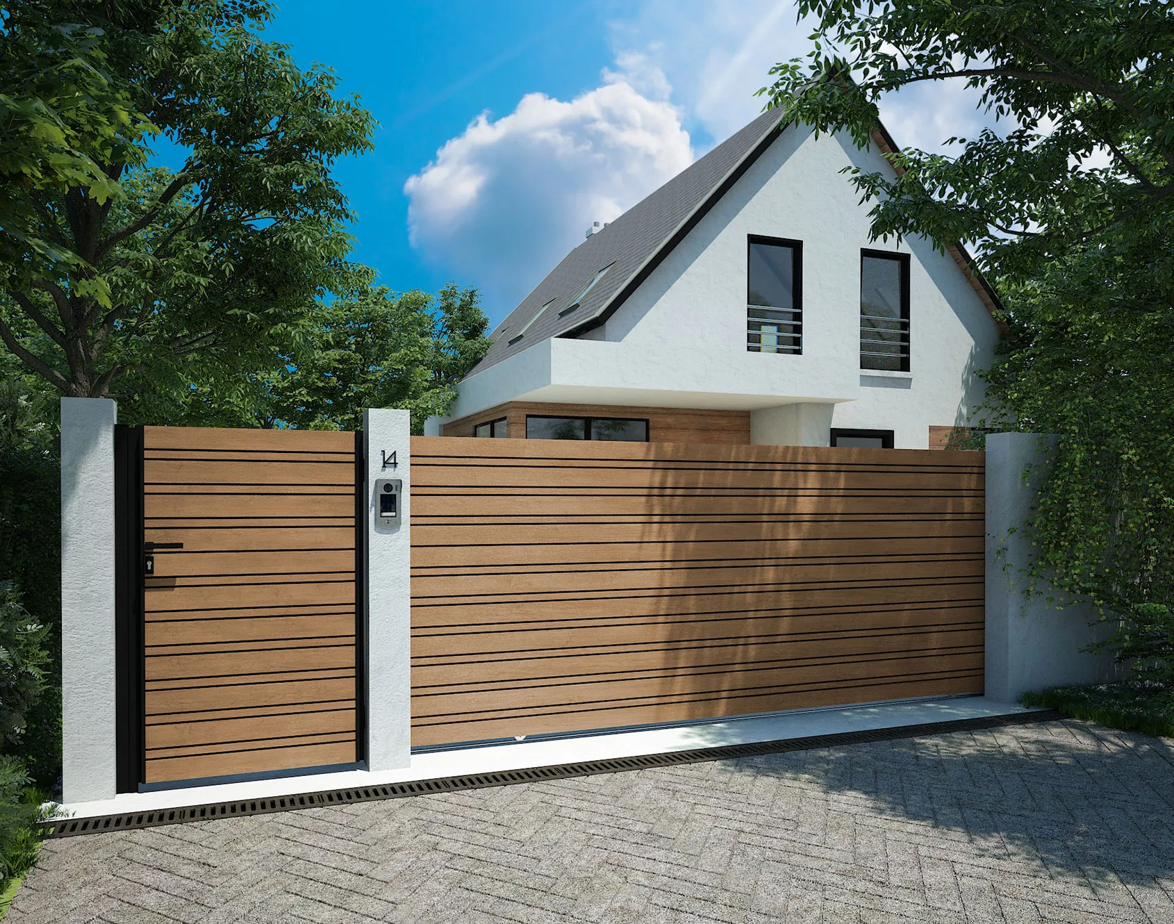 Portail coulissant aspect bois et clôture assortie devant une maison blanche